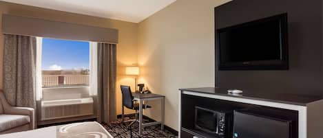 Chambre, 1 très grand lit, accessible aux personnes à mobilité réduite, non-fumeur | Bureau, fer et planche à repasser, accès au Wi-Fi (inclus)