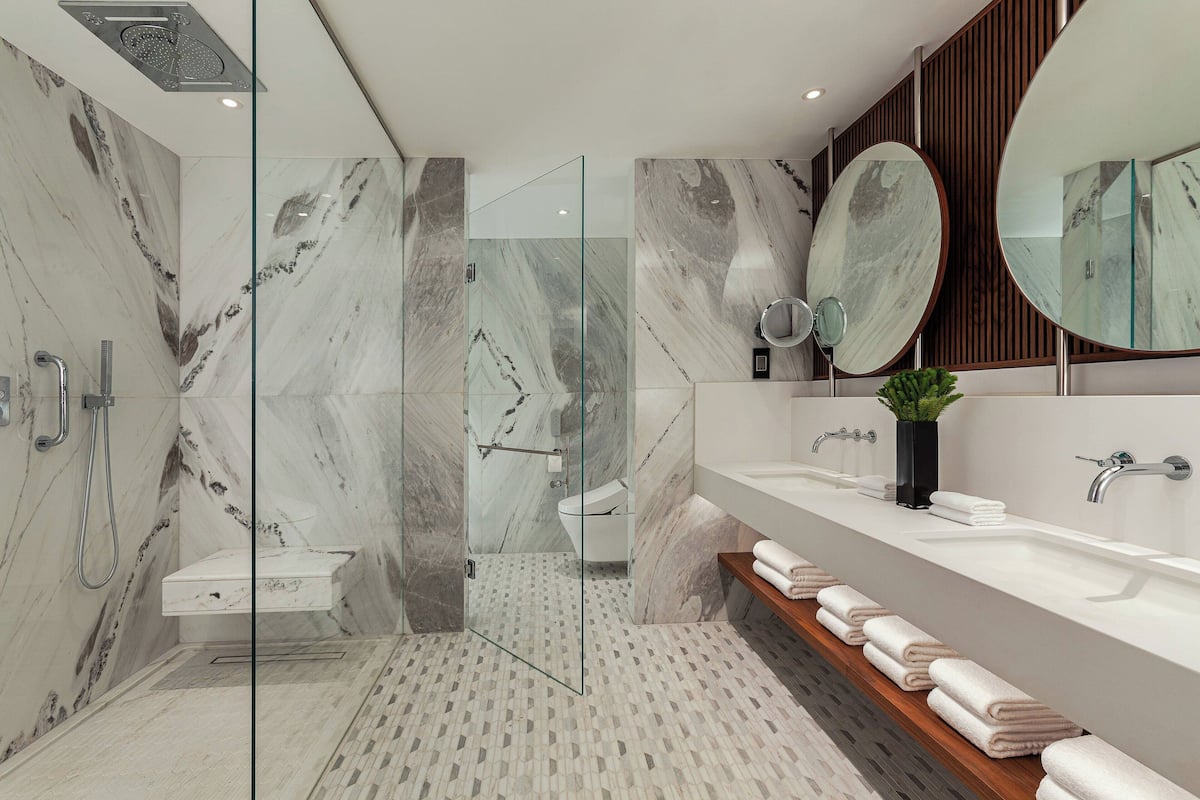 presidential suite, 1 king bed, non smoking | bathroom | free toiletries, hair dryer, bathrobes, slippers