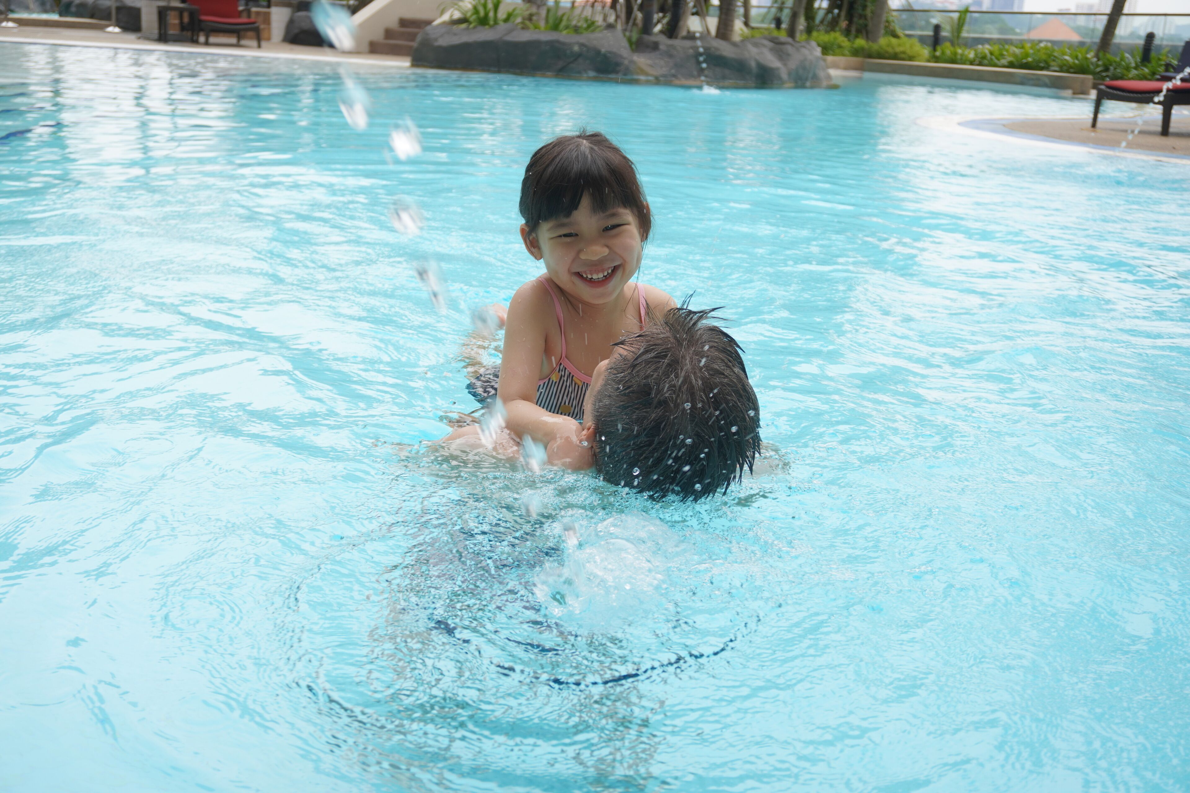 Outdoor pool, open 7:00 AM to 11:00 PM, pool umbrellas, sun loungers