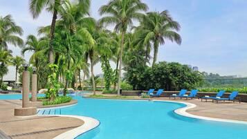 Outdoor pool, open 7:00 AM to 11:00 PM, pool umbrellas, sun loungers