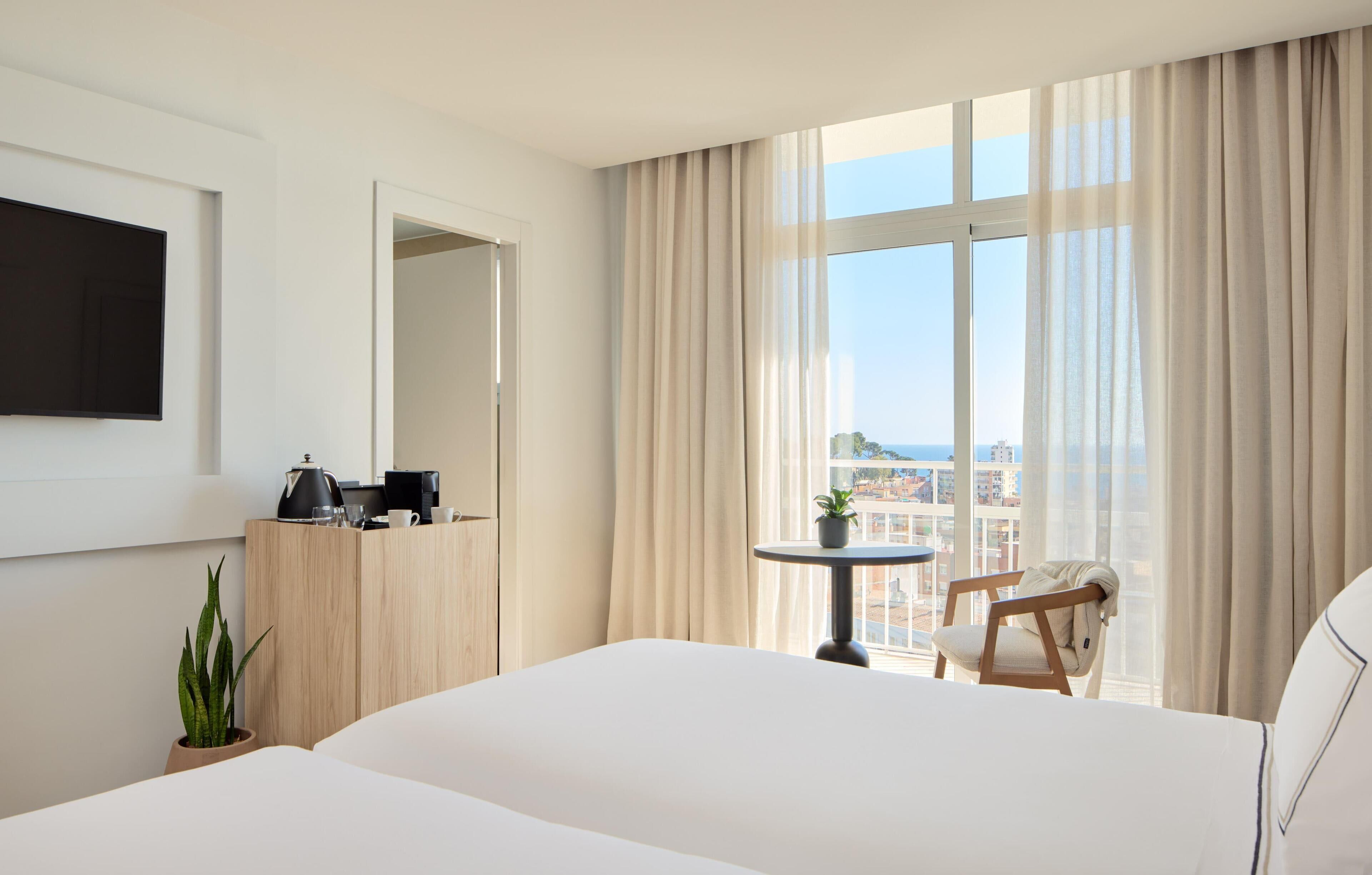 Frigobar, quartos à prova de som, berços grátis, Wi-Fi de cortesia