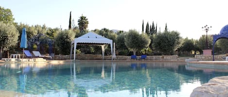 Outdoor pool, pool umbrellas, pool loungers