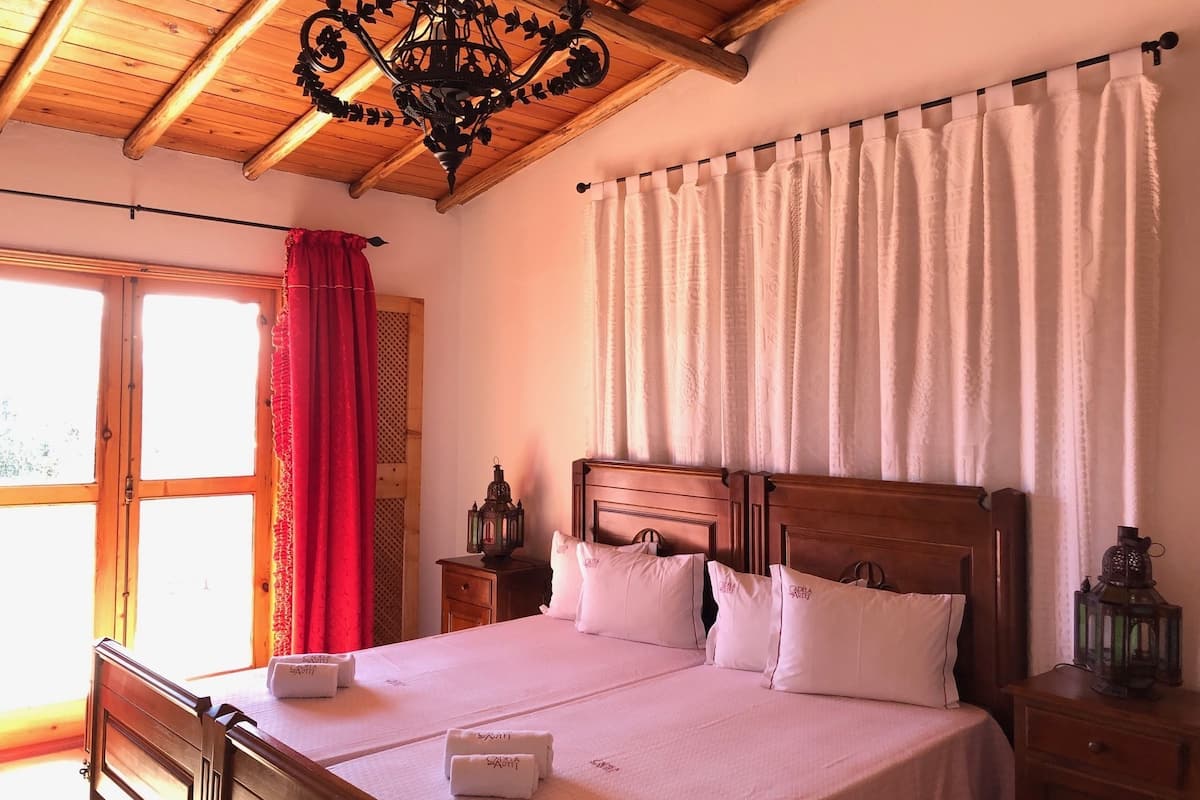 classic double or twin room, refrigerator, garden view | in-room safe, individually decorated, individually furnished, desk