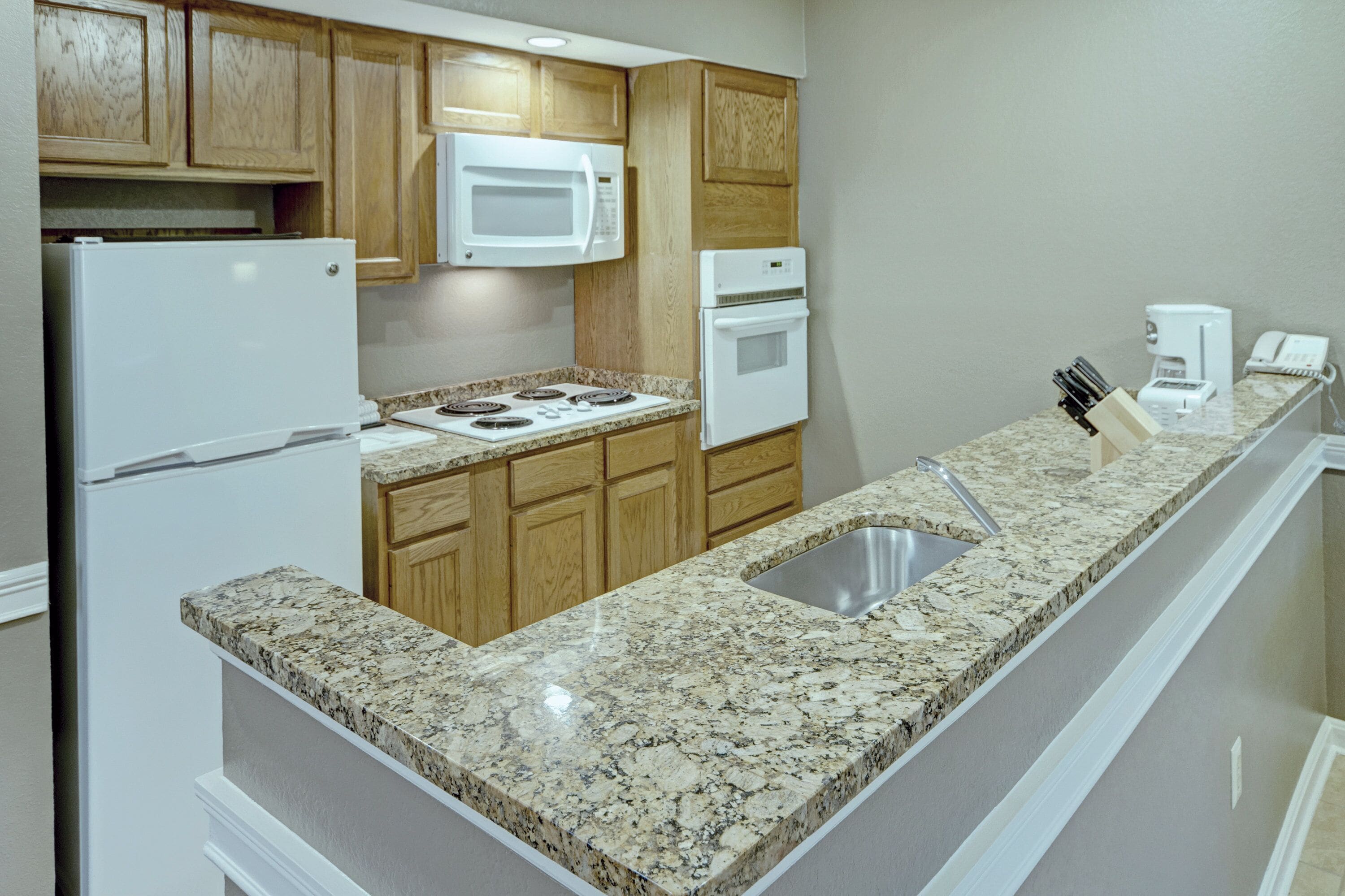 standard studio suite | private kitchen | fridge, microwave, oven, stovetop