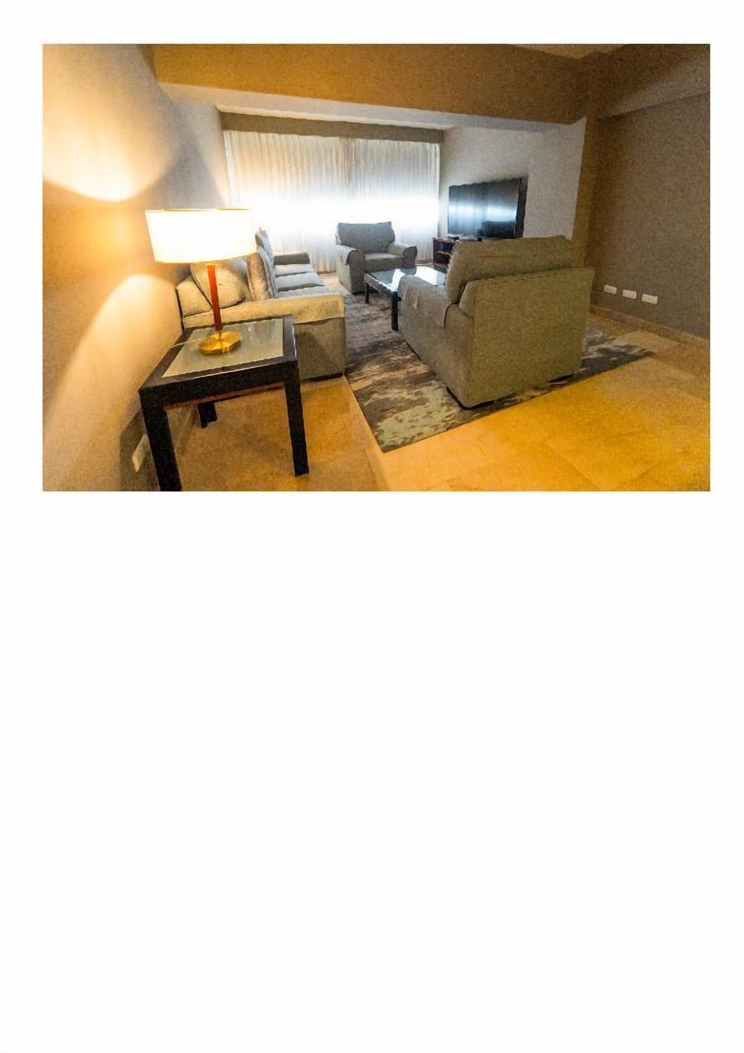 premium suite, 1 bedroom, non smoking | living area | 32-inch plasma tv with cable channels, tv, pay films