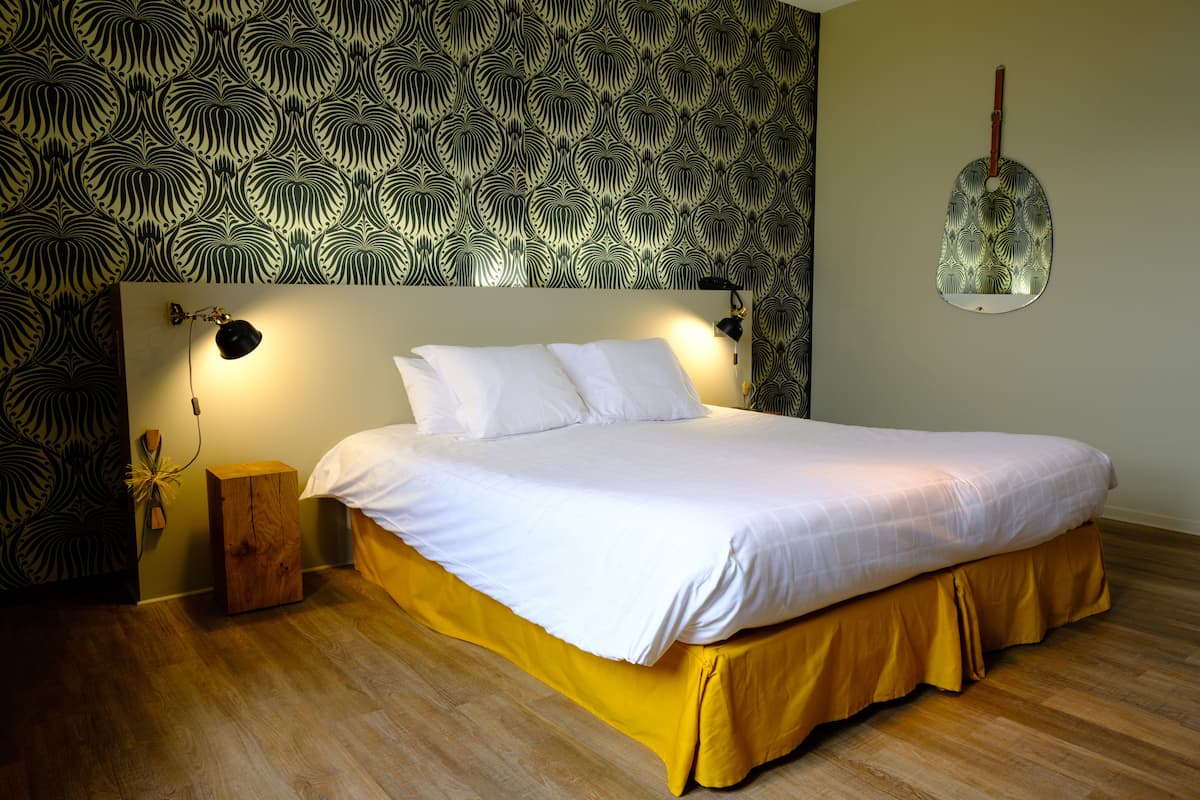 Executive Room | Premium bedding, individually decorated, desk, blackout curtains