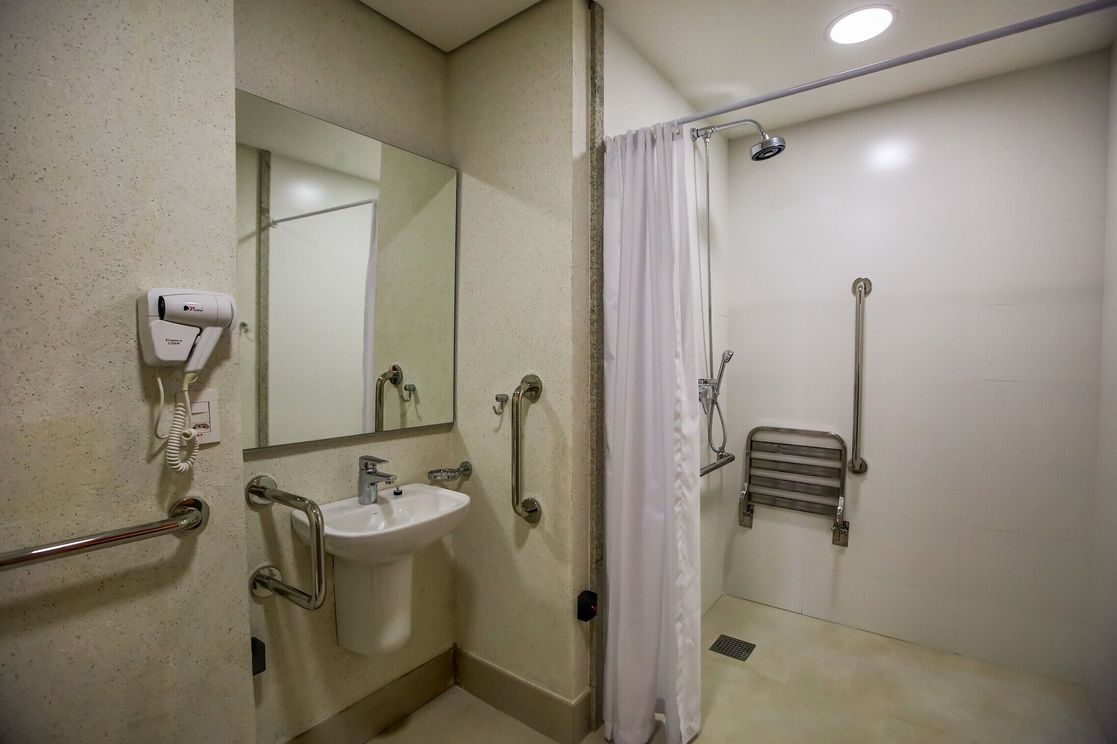 superior room, accessible (handicap) | bathroom | shower, free toiletries, hair dryer, towels