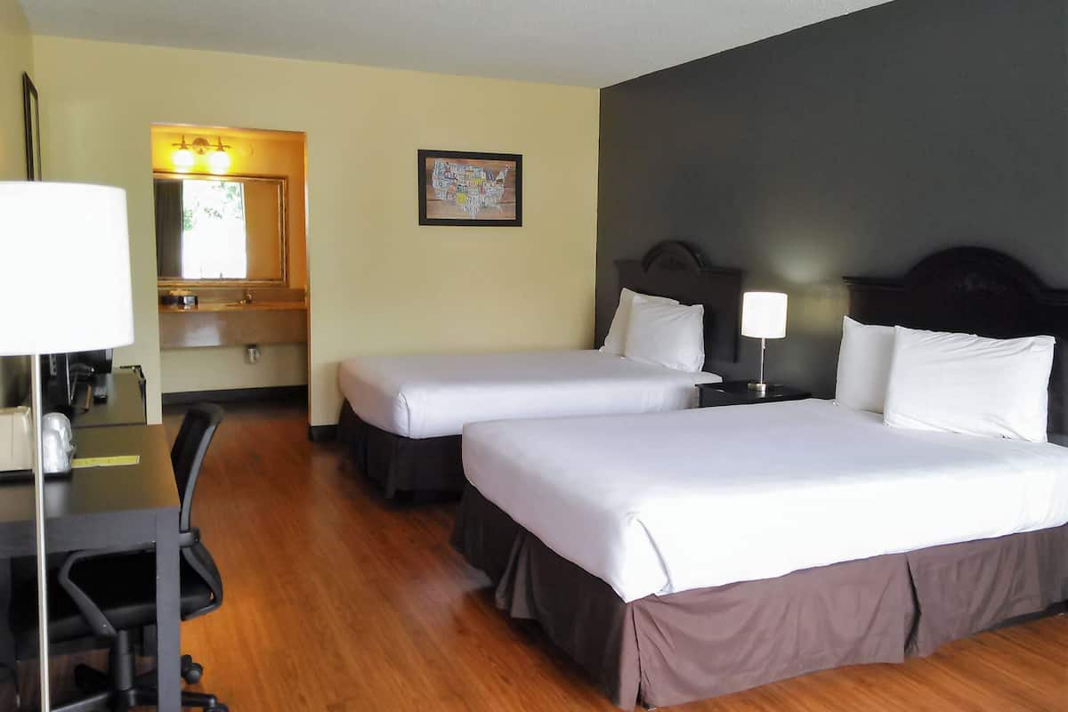 Desk, blackout drapes, rollaway beds (surcharge), WiFi (free)