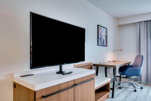 Desk, laptop workspace, blackout curtains, iron/ironing board