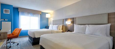 Desk, blackout drapes, iron/ironing board, free cribs/infant beds