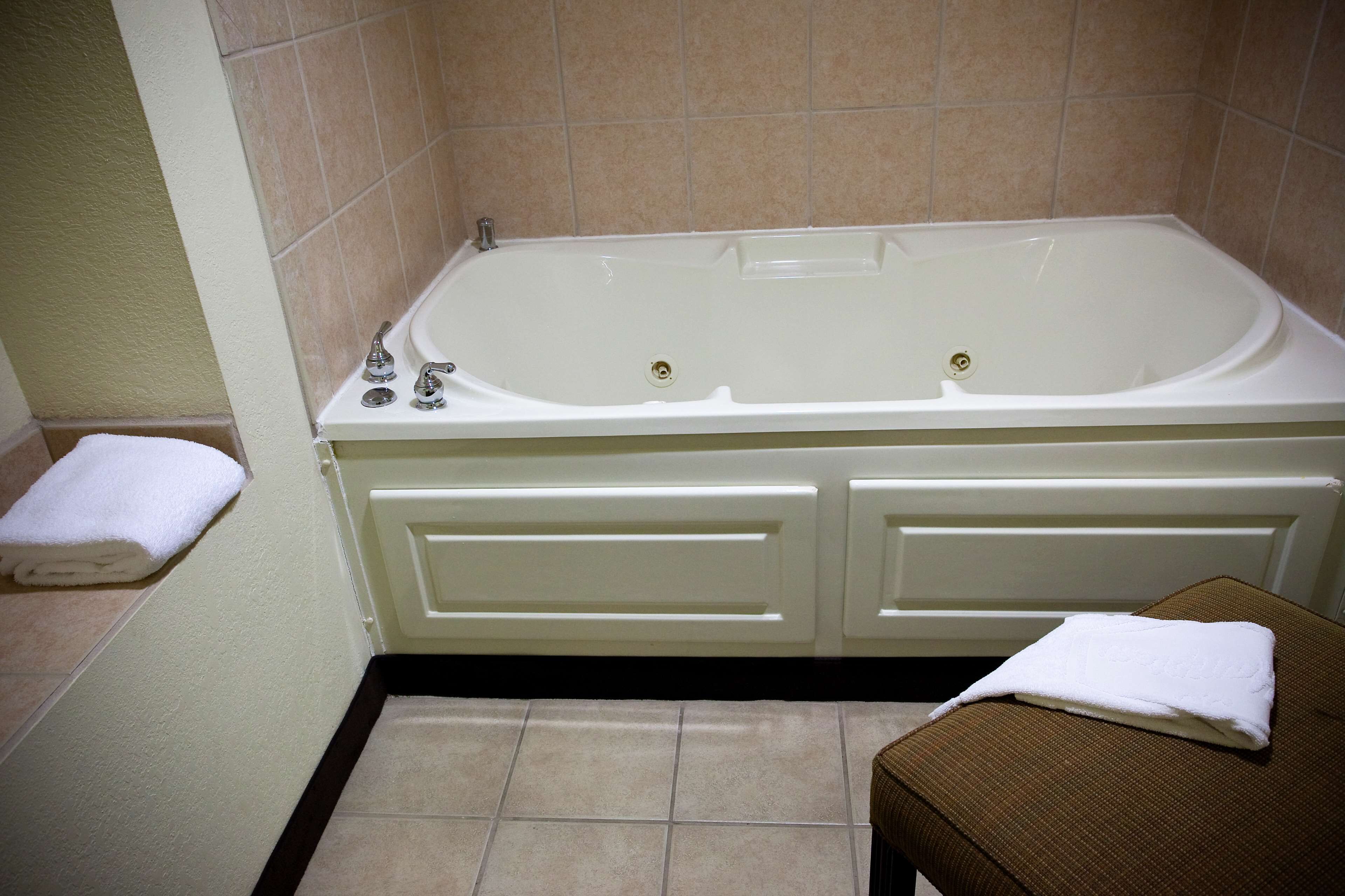 room, 1 king bed, non smoking | bathroom | combined shower/bathtub, spring water bathtub, hydromassage showerhead