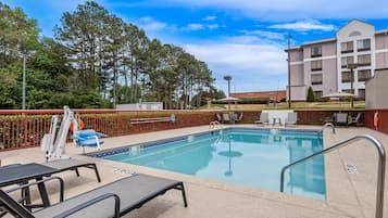 Seasonal outdoor pool, open 10 AM to 10 PM, pool loungers