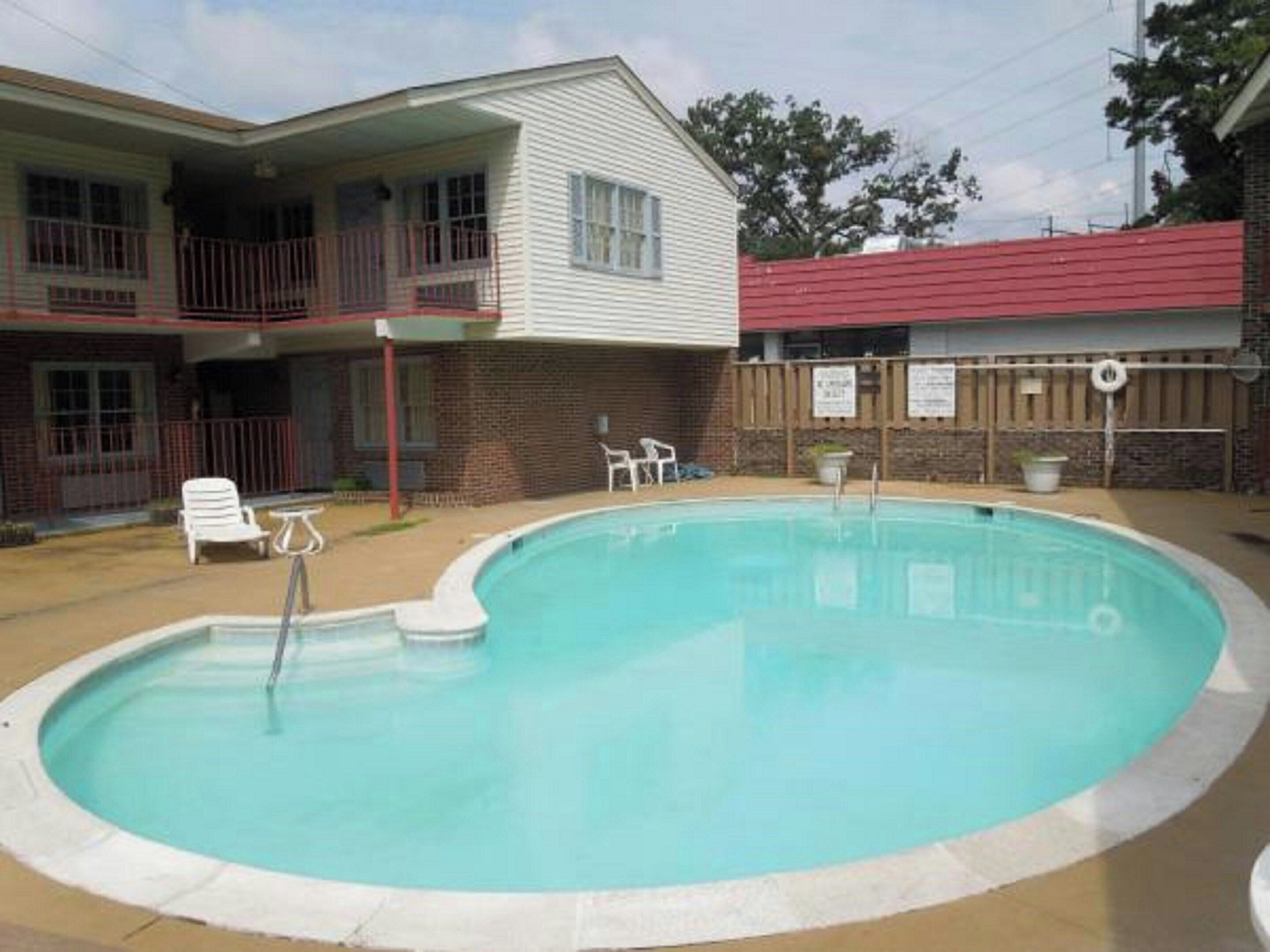 Seasonal outdoor pool, pool umbrellas, pool loungers