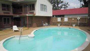 Seasonal outdoor pool, pool umbrellas, pool loungers