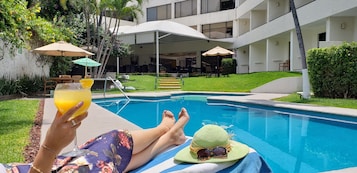 2 outdoor pools, open 8:00 AM to 8:00 PM, pool umbrellas, sun loungers
