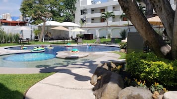 2 outdoor pools, open 8:00 AM to 8:00 PM, pool umbrellas, pool loungers
