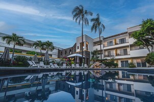 2 outdoor pools, open 8:00 AM to 8:00 PM, pool umbrellas, sun loungers