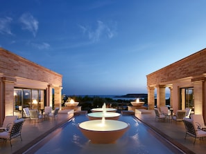 2 bars/lounges, poolside bar, beach bar