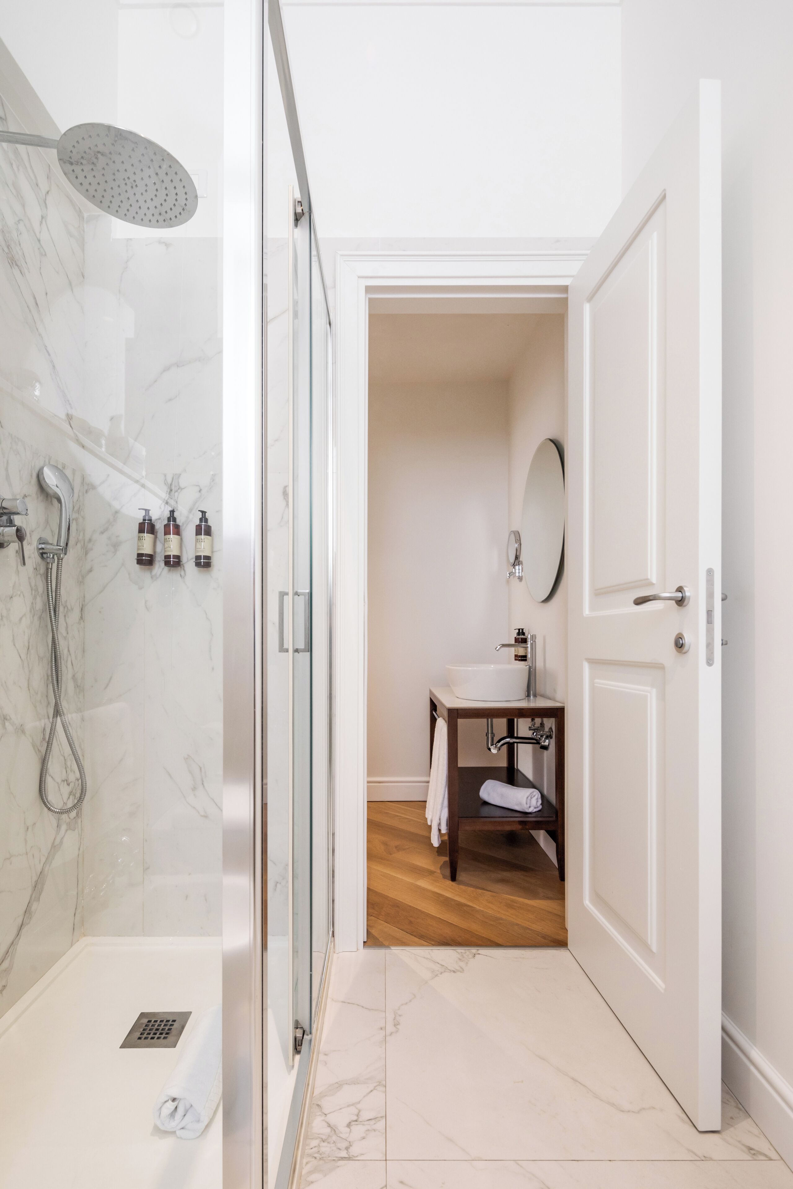 suite | bathroom | shower, hair dryer, bidet, towels