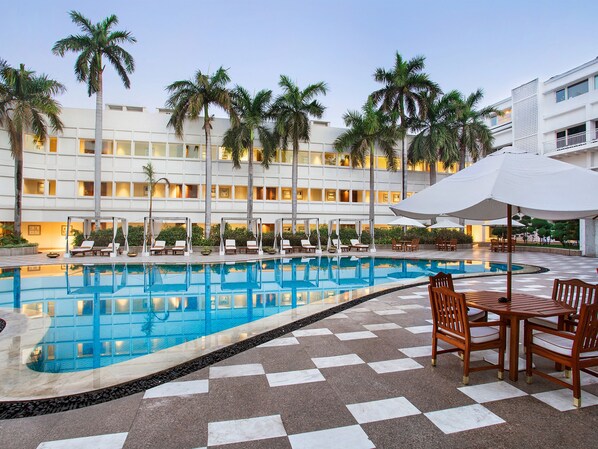 Outdoor pool, pool umbrellas, pool loungers