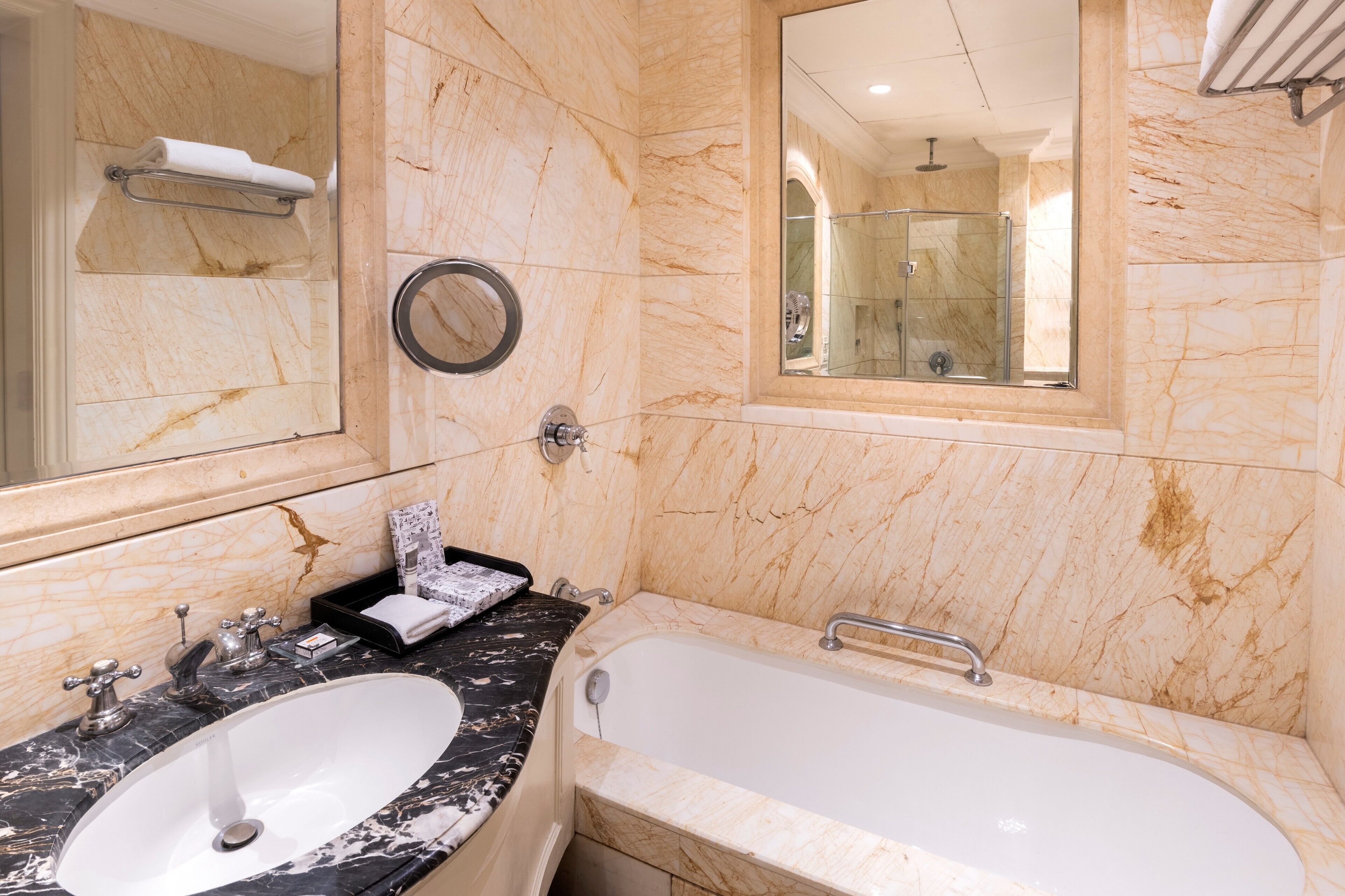 designer toiletries, hair dryer, bathrobes, slippers