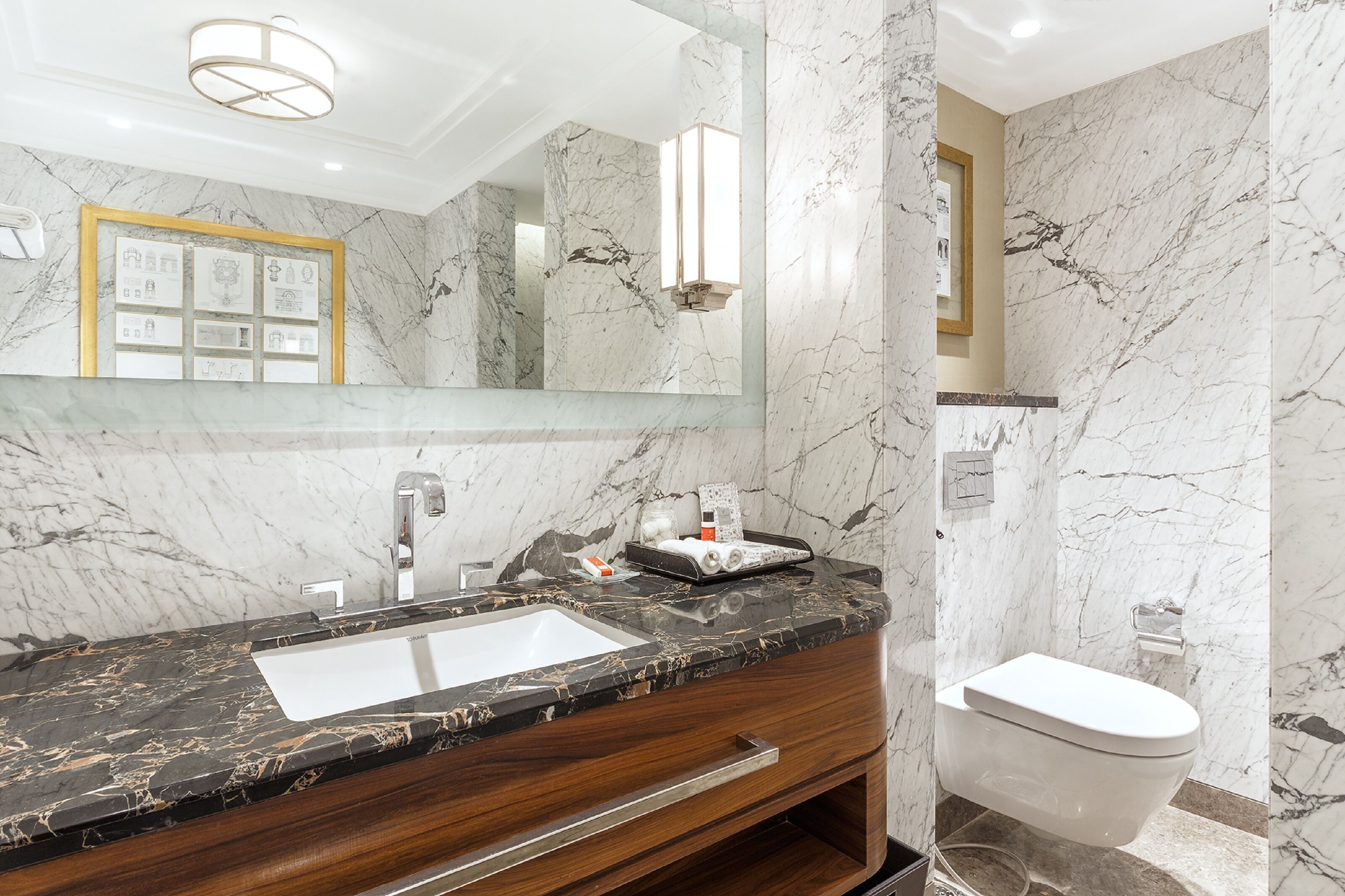Designer toiletries, hair dryer, bathrobes, slippers