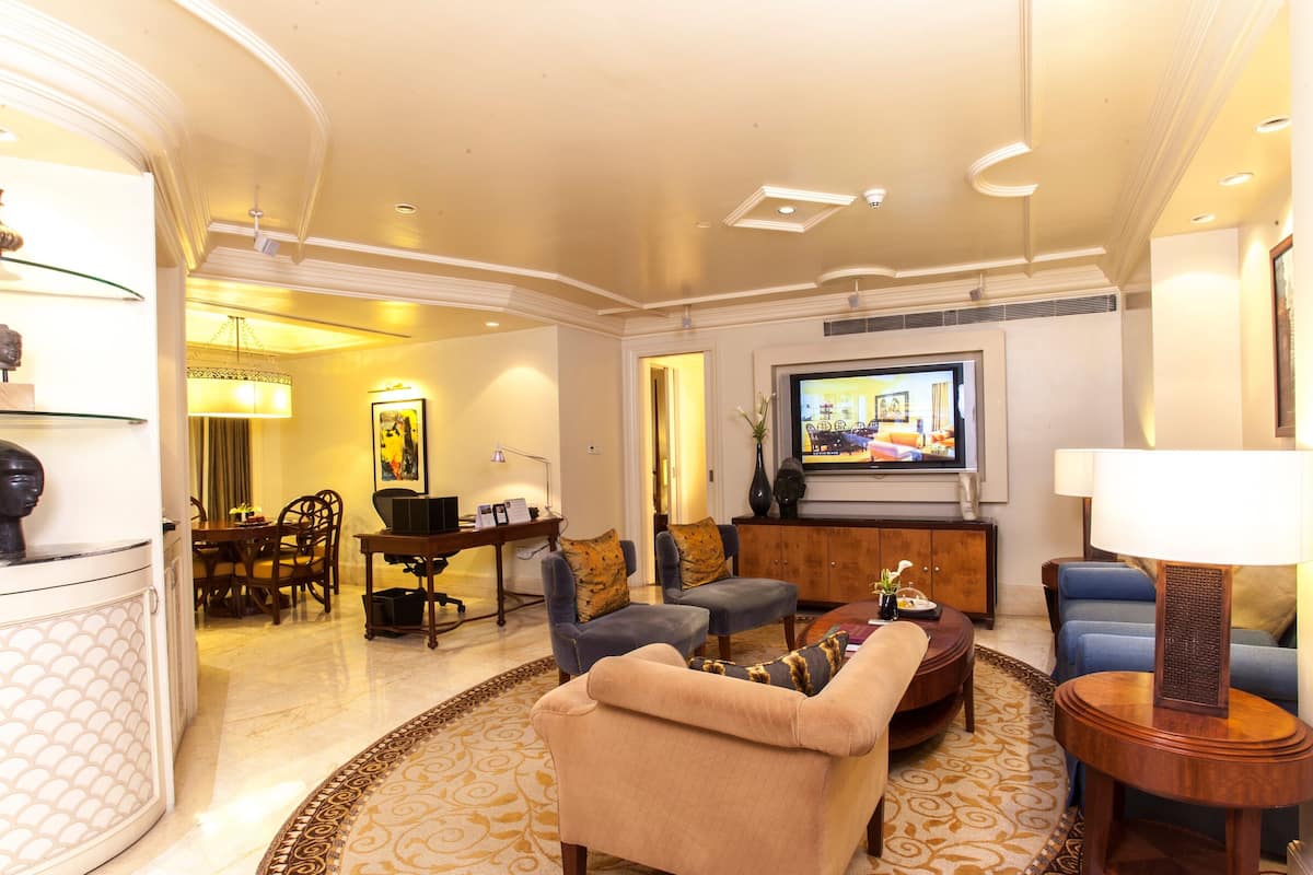 Luxury Suite, Non Smoking (Lutyens) | Living area | 55-inch plasma TV with digital channels, TV, Netflix