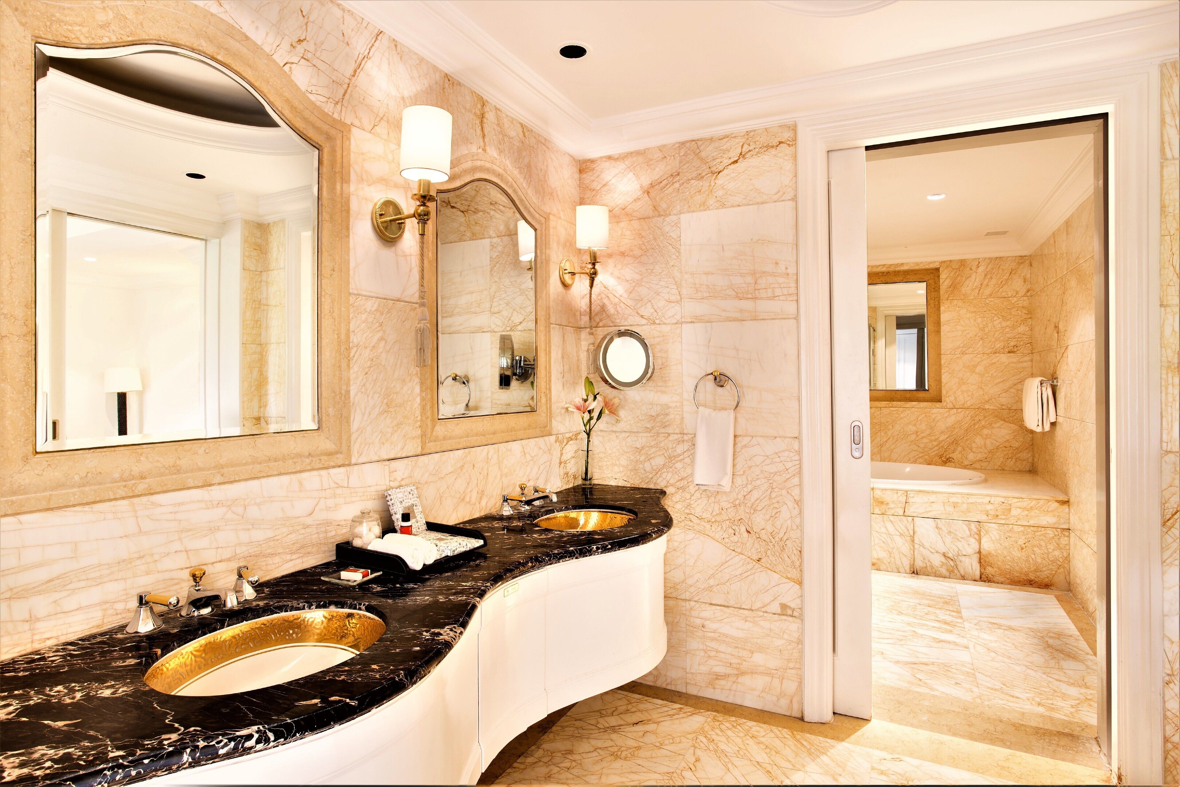 designer toiletries, hair dryer, bathrobes, slippers