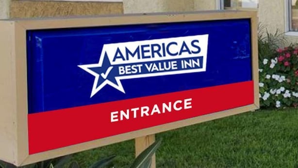A sign for the Americas Best Value Inn with a star logo and the words "ENTRANCE" at the bottom. - Americas Best Value Inn Holly Springs (Holly Springs)