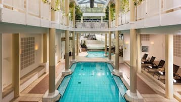 Indoor pool, outdoor pool, pool umbrellas, sun loungers