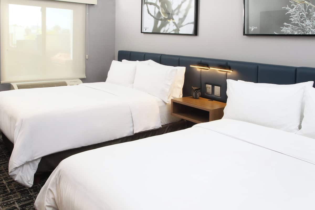 Suite, 2 Double Beds | 1 bedroom, in-room safe, desk, free cribs/infant beds