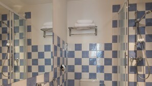 A modern bathroom with a large white sink, a glass-enclosed shower, and a toilet. - Villa la Tour (Nice)