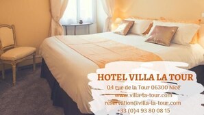 A hotel room with a large bed, a chair, a TV, and a window with curtains. The room has a warm color scheme. - Villa la Tour (Nice)