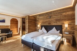 Deluxe Suite, 1 Bedroom, Sauna, Mountain View | 1 bedroom, Frette Italian sheets, premium bedding, down comforters