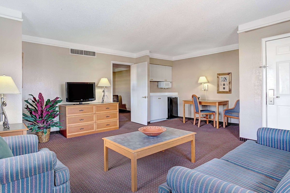 Suite, 2 Queen Beds, Non Smoking | Desk, laptop workspace, blackout drapes, iron/ironing board