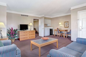 Suite, 2 Queen Beds, Non Smoking | Desk, laptop workspace, blackout curtains, iron/ironing board