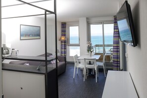 Apartment, Sea View | Living area | 110-cm flat-screen TV with digital channels, TV - Résidence Victoria Surf (Biarritz)