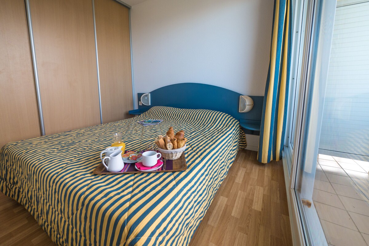 Blackout drapes, iron/ironing board (on request), WiFi (free)