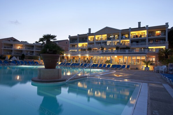 Seasonal outdoor pool, pool umbrellas, pool loungers