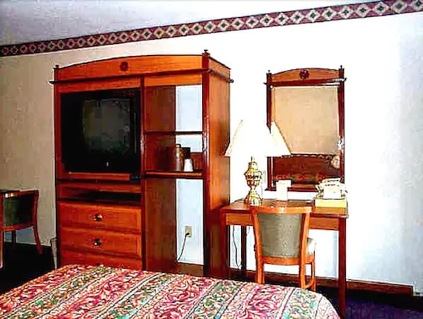 Chambre Deluxe, très grand lit | Ameublement unique, bureau, rideaux d’obscurcissement