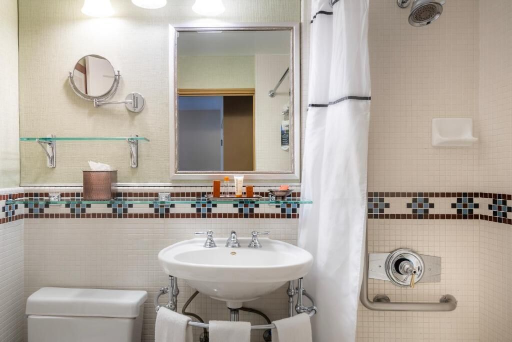 combined shower/bathtub, free toiletries, hair dryer, bathrobes