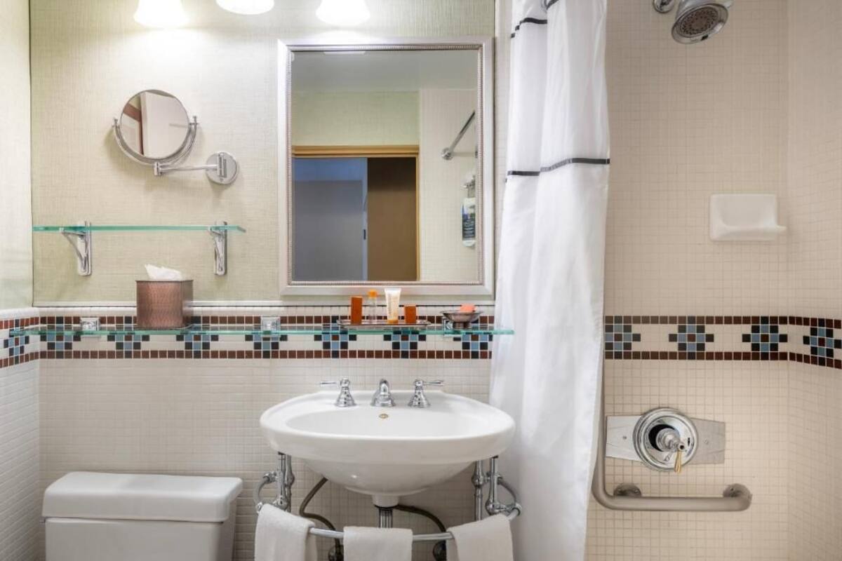 combined shower/bathtub, free toiletries, hair dryer, bathrobes