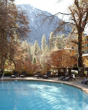 Outdoor pool, open 9:00 AM to 5:00 PM, pool umbrellas, pool loungers