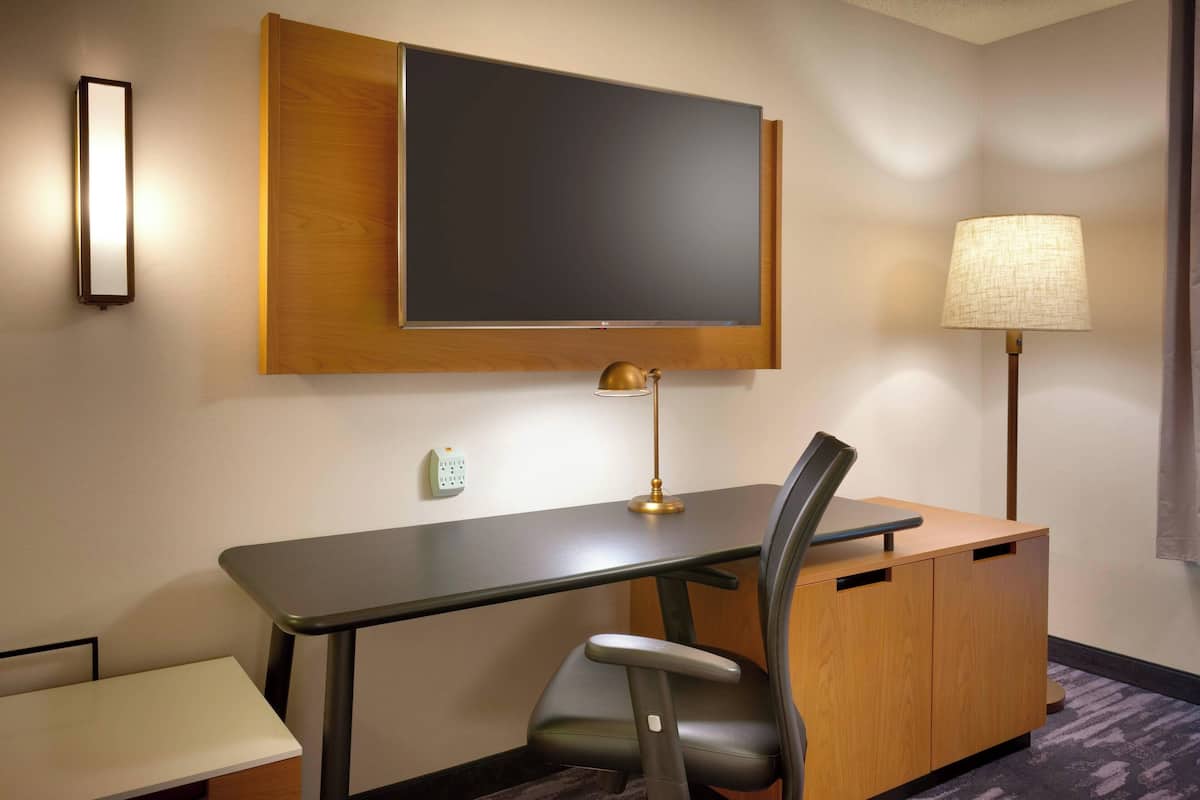 Desk, blackout drapes, soundproofing, iron/ironing board