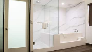 Romantic Suite, 1 King Bed, Jetted Tub | Bathroom | Free toiletries, hair dryer, towels