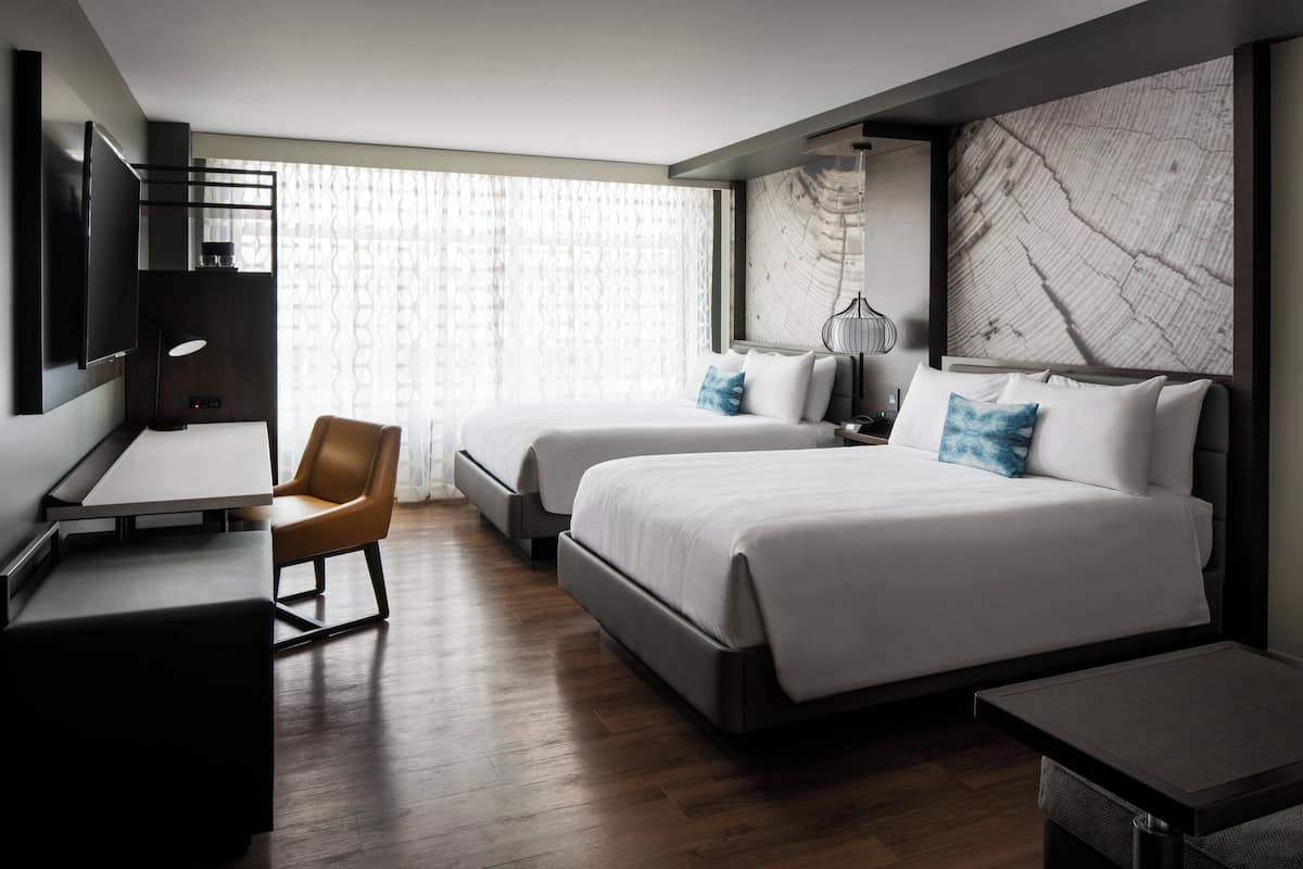 Premium bedding, pillowtop beds, desk, blackout drapes