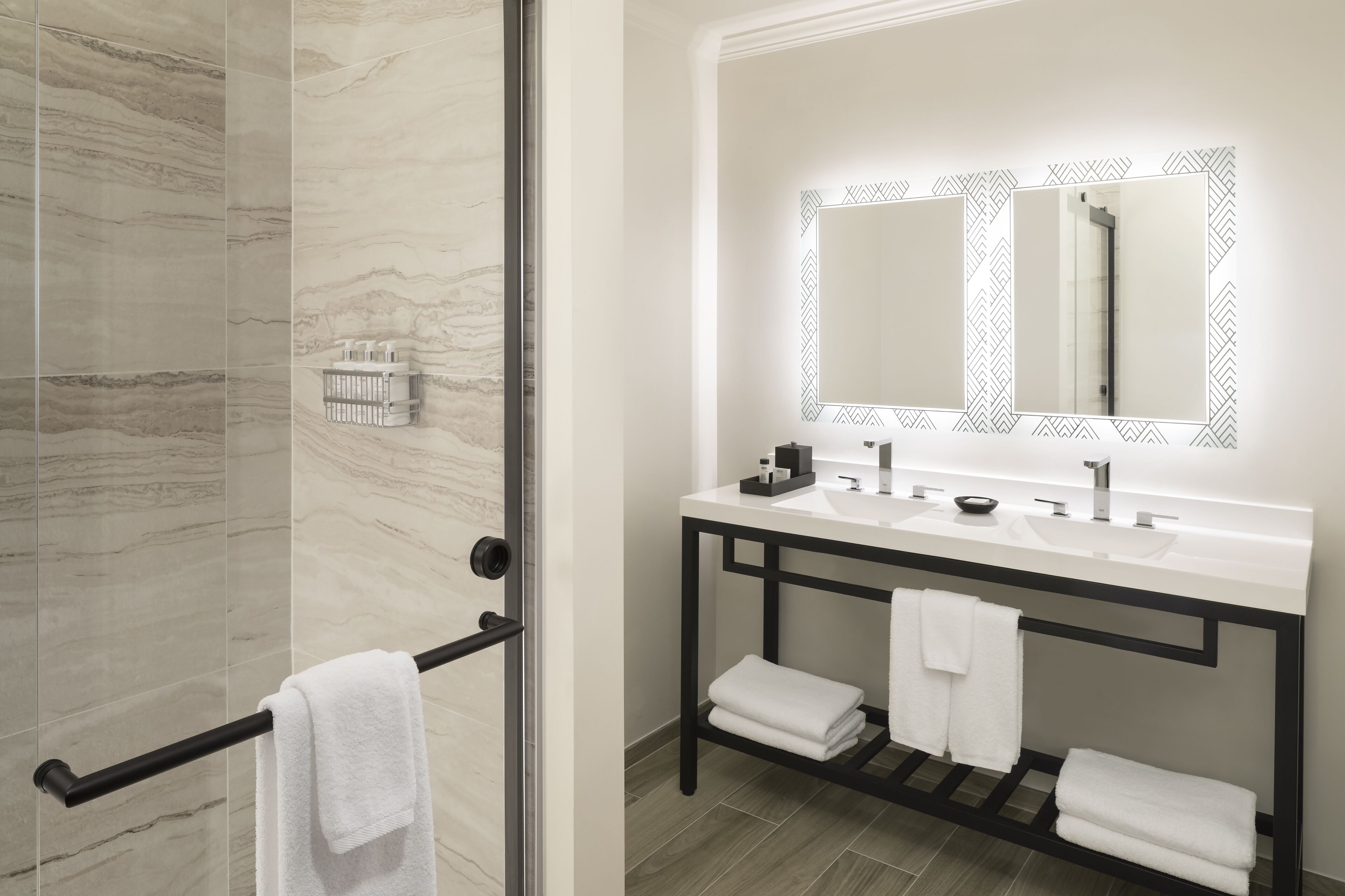 designer toiletries, hair dryer, bathrobes, towels