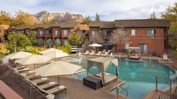 Outdoor pool, open 7:00 AM to 10:00 PM, free cabanas, pool umbrellas