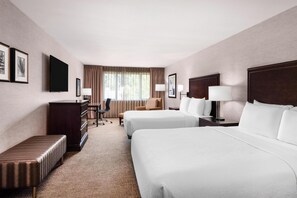 Premium bedding, desk, laptop workspace, soundproofing