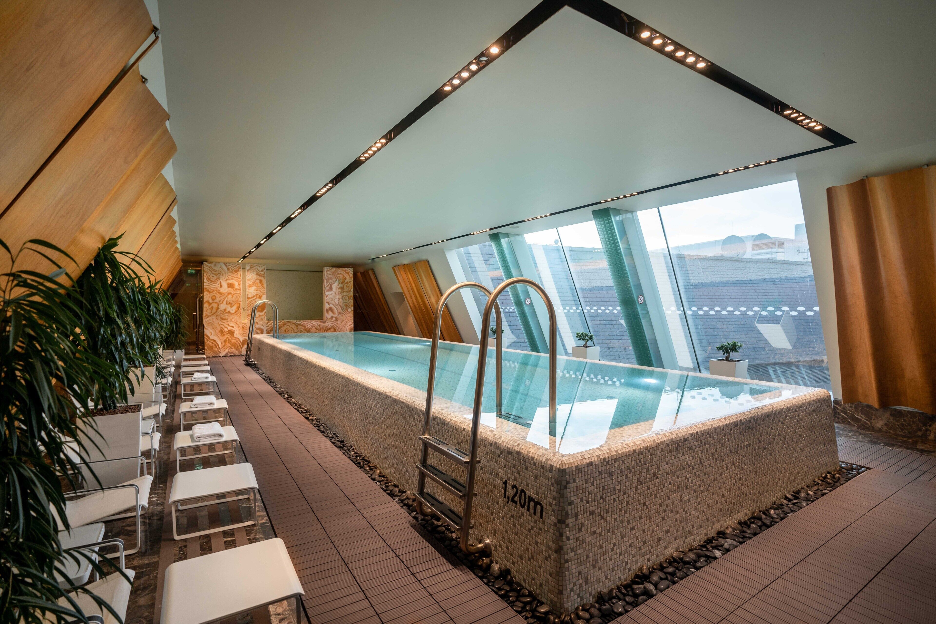 Indoor pool, open 7:00 AM to 10:00 PM, sun loungers